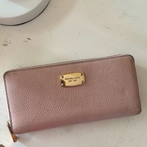 Michael Kors Pink leather zip wallet gold logo plate